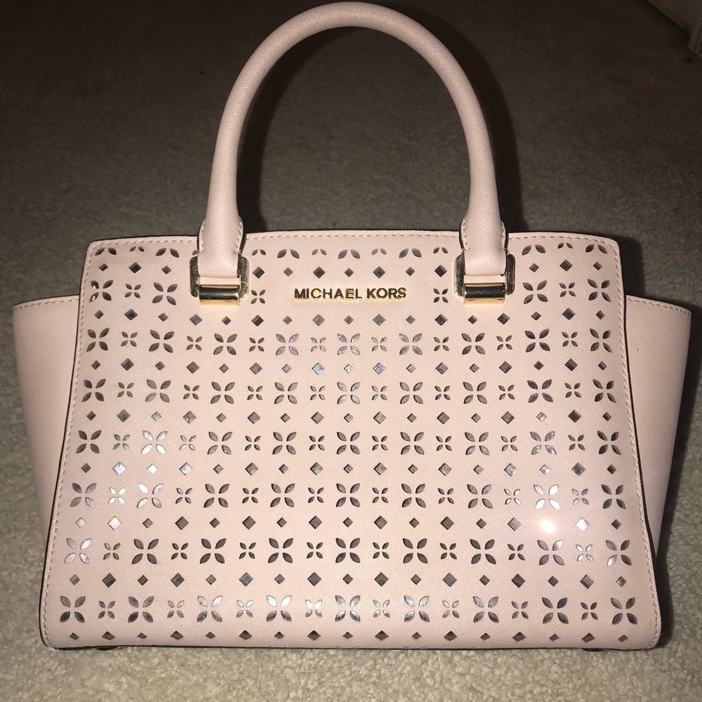 Laser cut Michael Kors purse